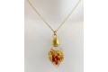 Fiole corail et or en pendentif